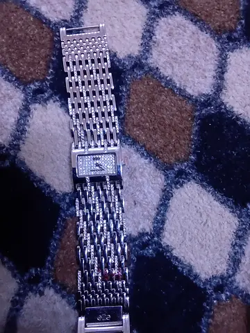 Silver-tone womens bracelet watch with rectangular face (pre-owned)
