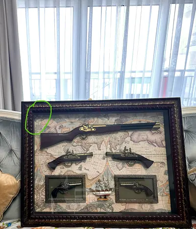 Framed Antique-Style Flintlock Pistols and Ship Display on Vintage Map