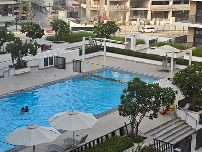 Spacious 1BR with Balcony | Pool View | Parking Included