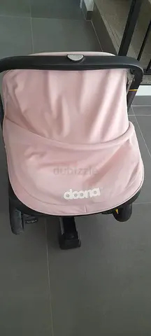 Doona stroller seat in light pink - used, good condition