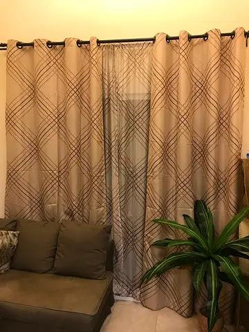 Beige patterned full-length curtains with sheer inner panel - set of 2