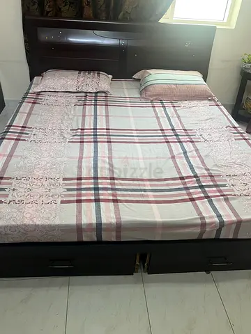 King size bed with side table