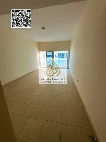 Two-bedroom apartment with a living room for annual rent in Ajman Towers One