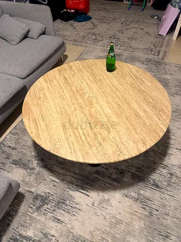 Round travertine coffee table - solid stone top