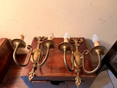 Pair of vintage brass wall sconces — 2-arm decorative light fixtures