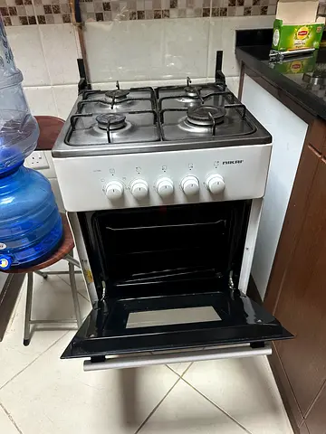 Used freestanding 4-burner gas stove with oven - good condition