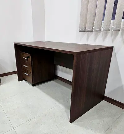 Dark wood office desk with lockable 3-drawer pedestal.