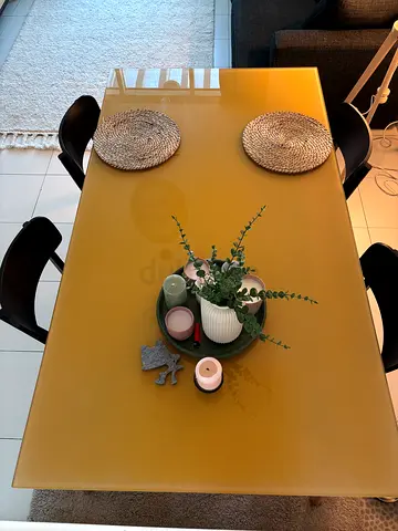 Modern mustard glass-top dining table with chairs