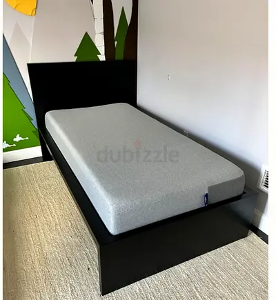 Malam single  bed 90/200cm bed and Ikea mattress is available in excellent condition,