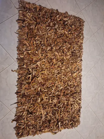 Abstract beige leather rug from Homecentre