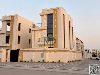 Modern corner villa, three floors, contemporary design and high-end finishing, 6 master bedrooms on an area of ​​3500 sq ft