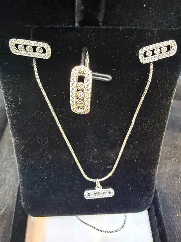 Silver-tone ring and matching necklace set with crystal accents