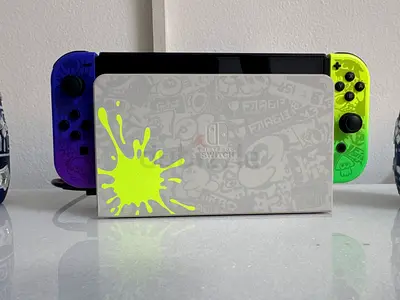 Nintendo switch splatoon 3 edition + micro sd card 128 gb + pro controller + fc24 with original pack