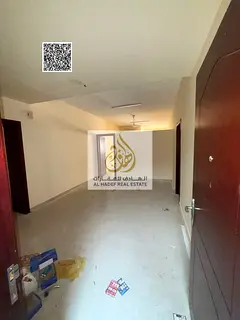Two-bedroom apartment with a living room for annual rent in Al Rawda 3