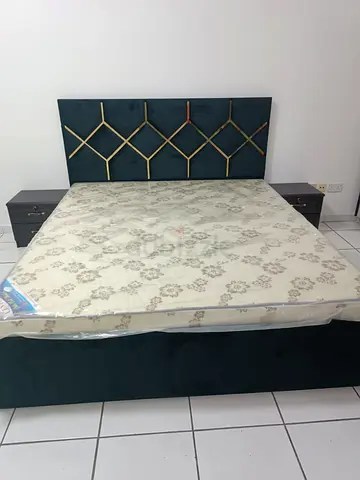 Queen size upholstered bed with mattress