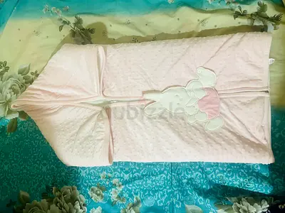 Light pink baby swaddle/hooded sleeping bag with bunny appliqué