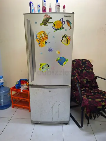 Used two-door refrigerator with freezer (working)