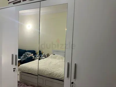 White 4-Door Wardrobe with Mirrored Doors - Good Condition