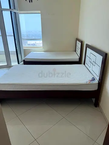 4 single wooden beds with mattresses - perfect condition
