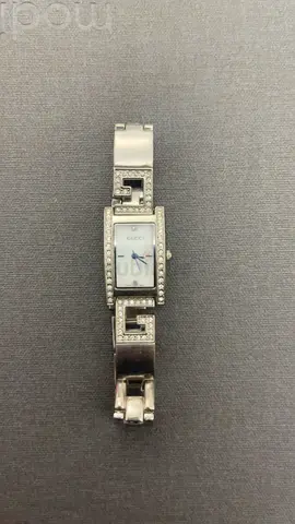 Gucci womens silver bracelet watch with crystal accents