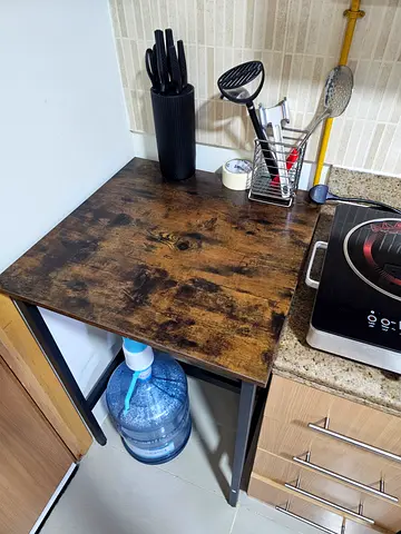 Compact kitchen cart with rustic wooden top and metal frame