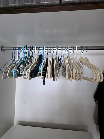 Set of various clothes hangers — mixed sizes, good condition ×~90