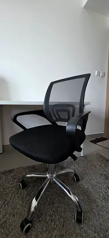 Ergonomic black mesh office chair with lumbar support - good condition