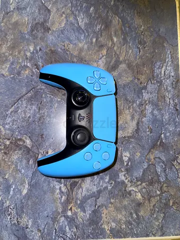 One controller original from sony and the left joystick cover is removed