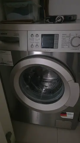 Bosch front-load washing machine - stainless steel, good working condition