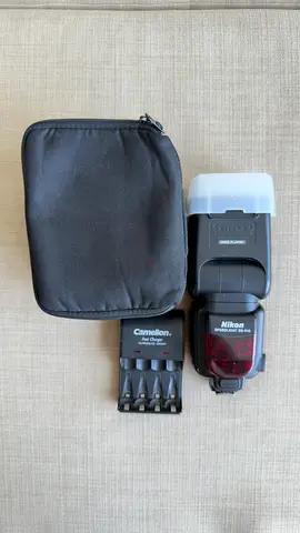 Nikon Speedlight SB-910 Flash with Camelion Fast Charger and Pouch