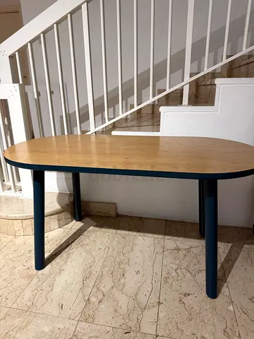 Crate and Barrel Oval wooden table with dark legs - good condition