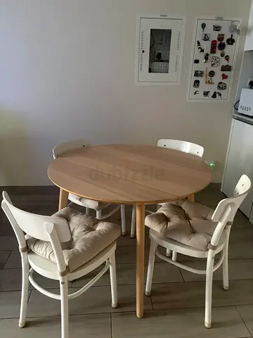 IKEA round wooden dining table with 4 white chairs - light oak finish
