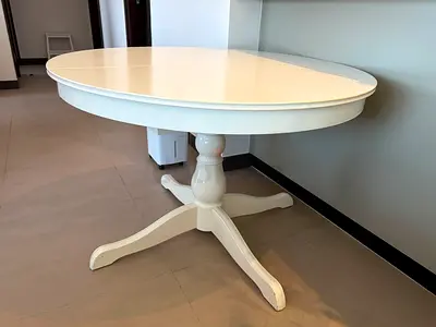 White Oval Dining Table with Pedestal Base - Seats 4 turns into 6