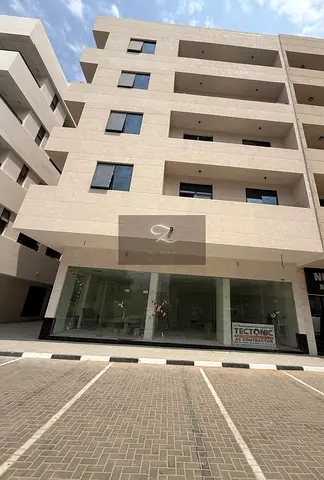 🏢 للبيع | بناية استثمارية مميزة – الشارقة | مويلح – الفلاح الجديدة