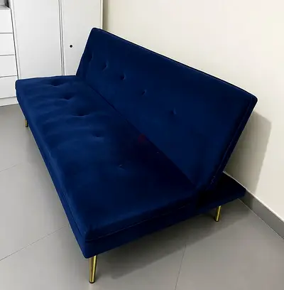 Blue velvet convertible sofa bed with gold legs - good condition purchased from Lulu