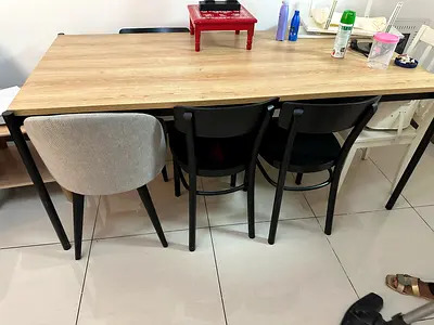 Wooden dining table with 4 mixed chairs - good condition