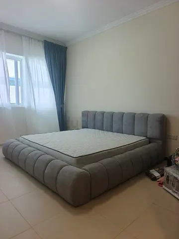 Modern Low-Profile Grey Upholstered King Bed with Headboard