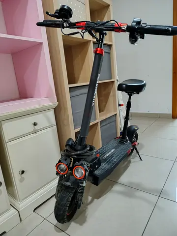 Dual-motor Electric Scooter with Seat and Front Suspension - Good Condition
