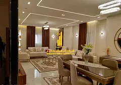 Two-bedroom apartment with a living room, fully furnished with new furniture, available for monthly