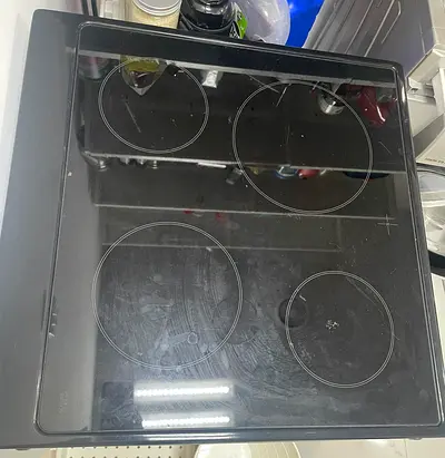 Used ceramic glass electric cooktop - 4-burner hob