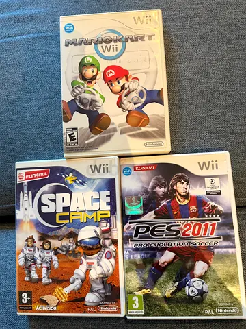 Bundle of 3 Wii Games: Mario Strikers, PES 2011, and space camp (Good condition)