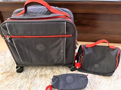 kipling  (carry-on spinner, toiletry bag, pouch) - same as new