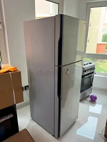 Used stainless steel double-door refrigerator - good working condition