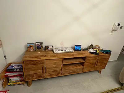 Modern Wooden Entertainment Center with Cabinets and Shelves