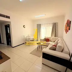 Beautiful furnished one-bedroom apartment with new furniture for monthly rent in Ajman - Al Rashidiy