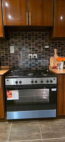 Stainless steel freestanding gas oven and cooker - good condition