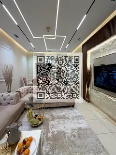 **Fully Furnished 2-Bedroom Apartment for Sale in Ajman One, Close to the Corniche**
