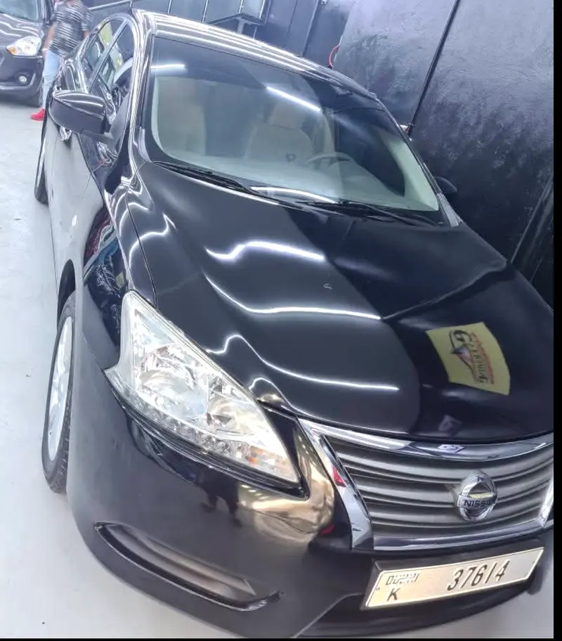 Nissan Sentra 2015 — photo 1 of 10