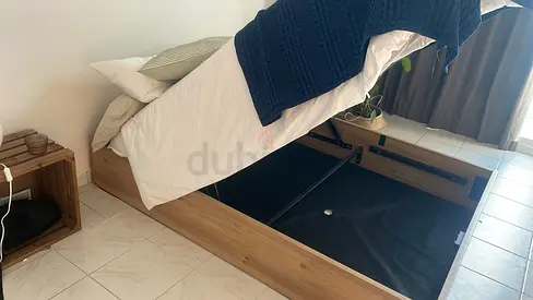 Queen Bed with storage under, must go! Urgent