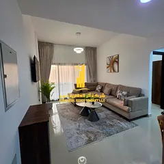 Luxury apartment, second occupancy, one bedroom, living room with open balcony. Ajman, Al Nuaimiya.